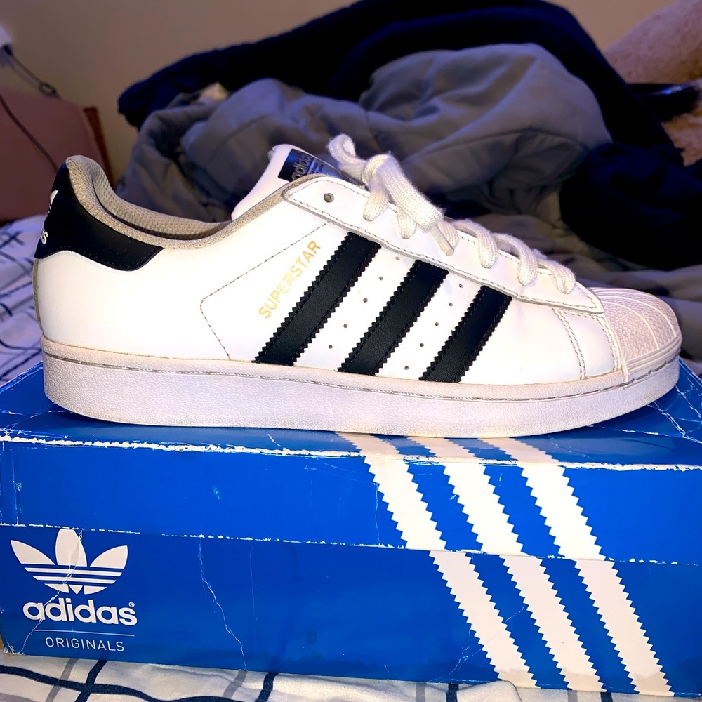 White adidas low tops